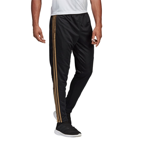 adidas track pants gold stripes